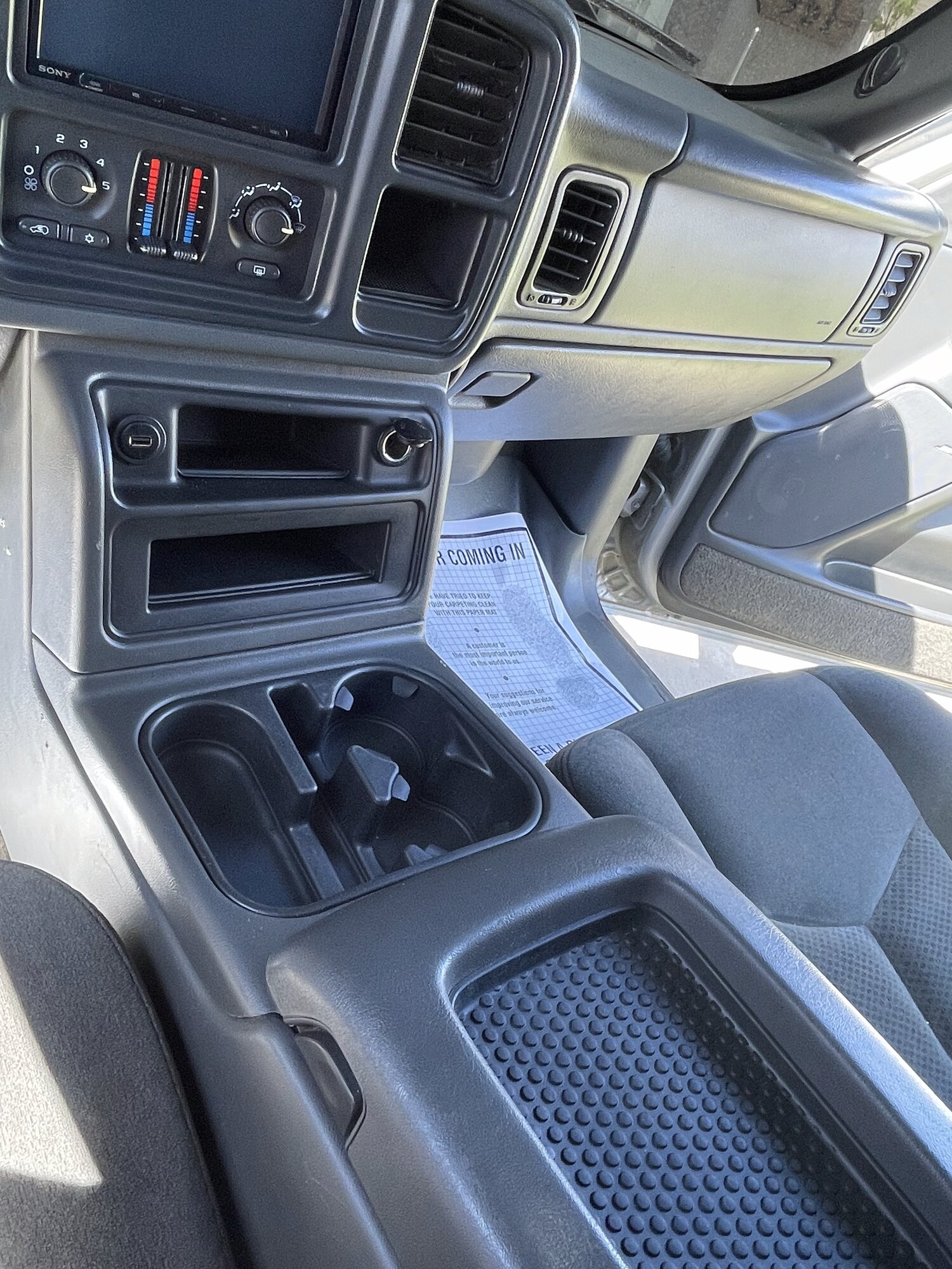 Clean center console after interior detail